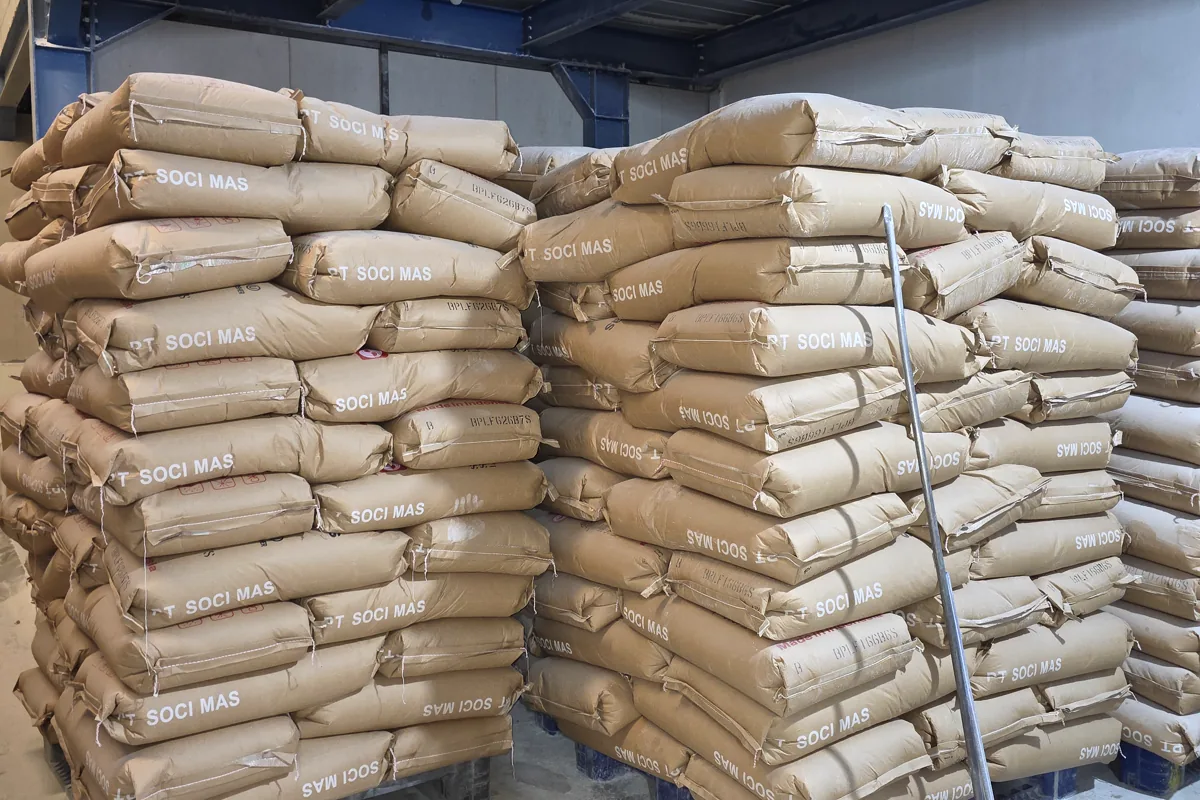 Palletized industrial material bags stored for manufacturing supply